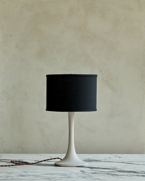 Small Trumpet table lamp with white wash finish and black drum shade