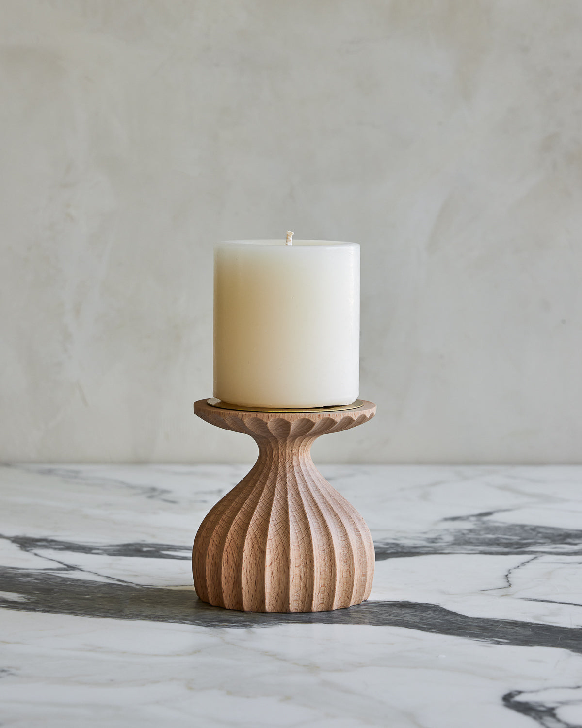 Short grooved natural maple wooden pillar candle holder with brass accents with white pillar candle