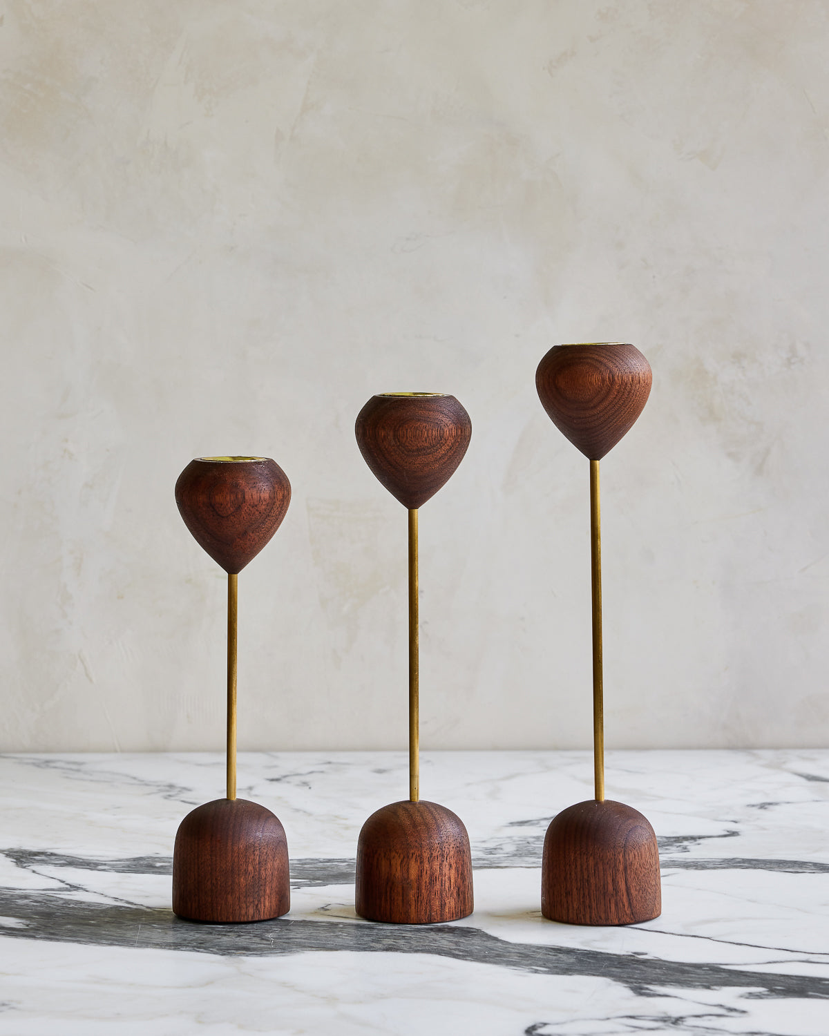 Modern black walnut and brass flower inspired candle holder