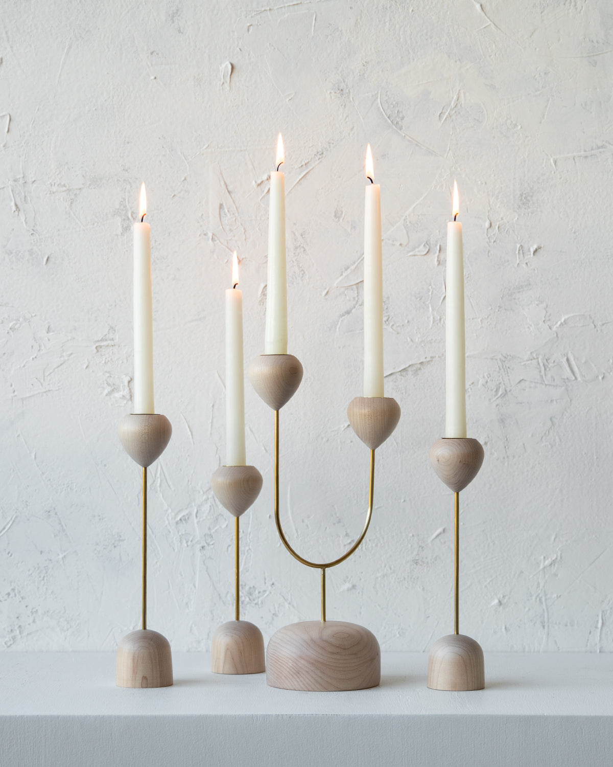 Modern maple and brass flower inspired candle holders