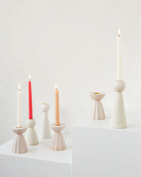Collection of white and blush pink ceramic candle holders
