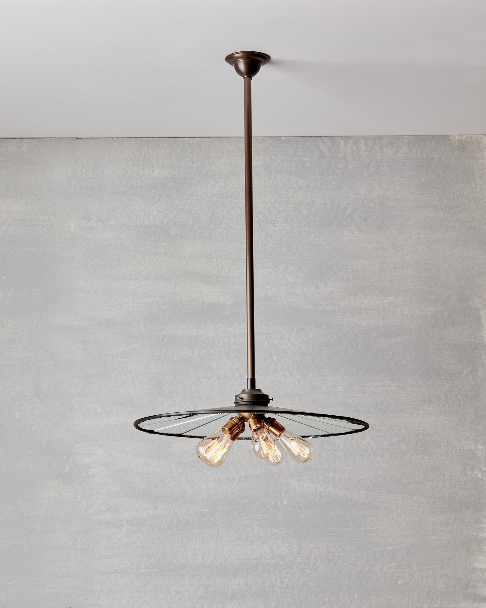 Large flat mirrored ceiling pendant with exposed lightbulbs. Made by RTO Lighting in Philadelphia. Hardwired light fixture. Simple interior design, made in the USA. #size_23" diameter