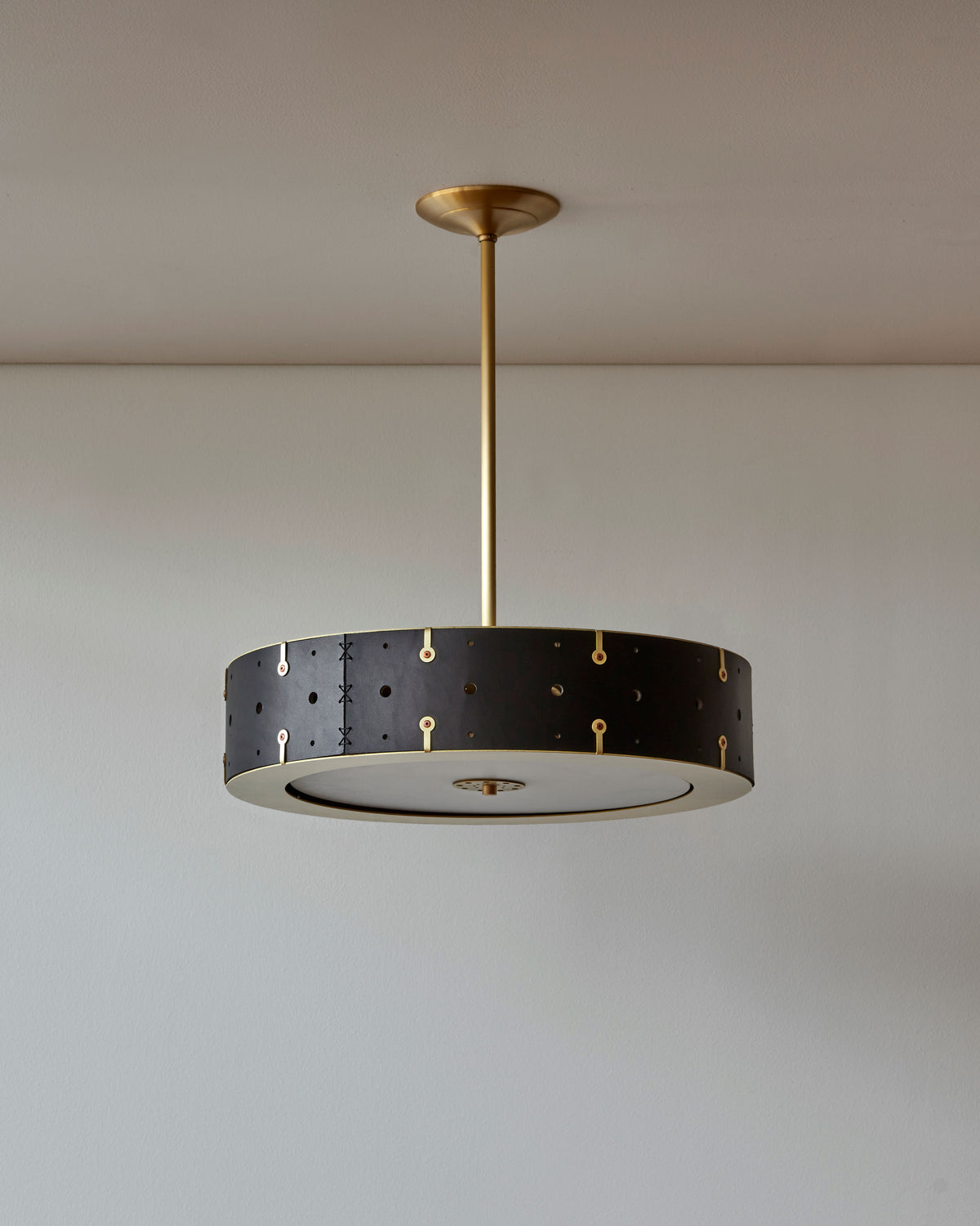Beautiful satin brass ceiling pendant fixture with handstitched leather drum shade and customizable drop 