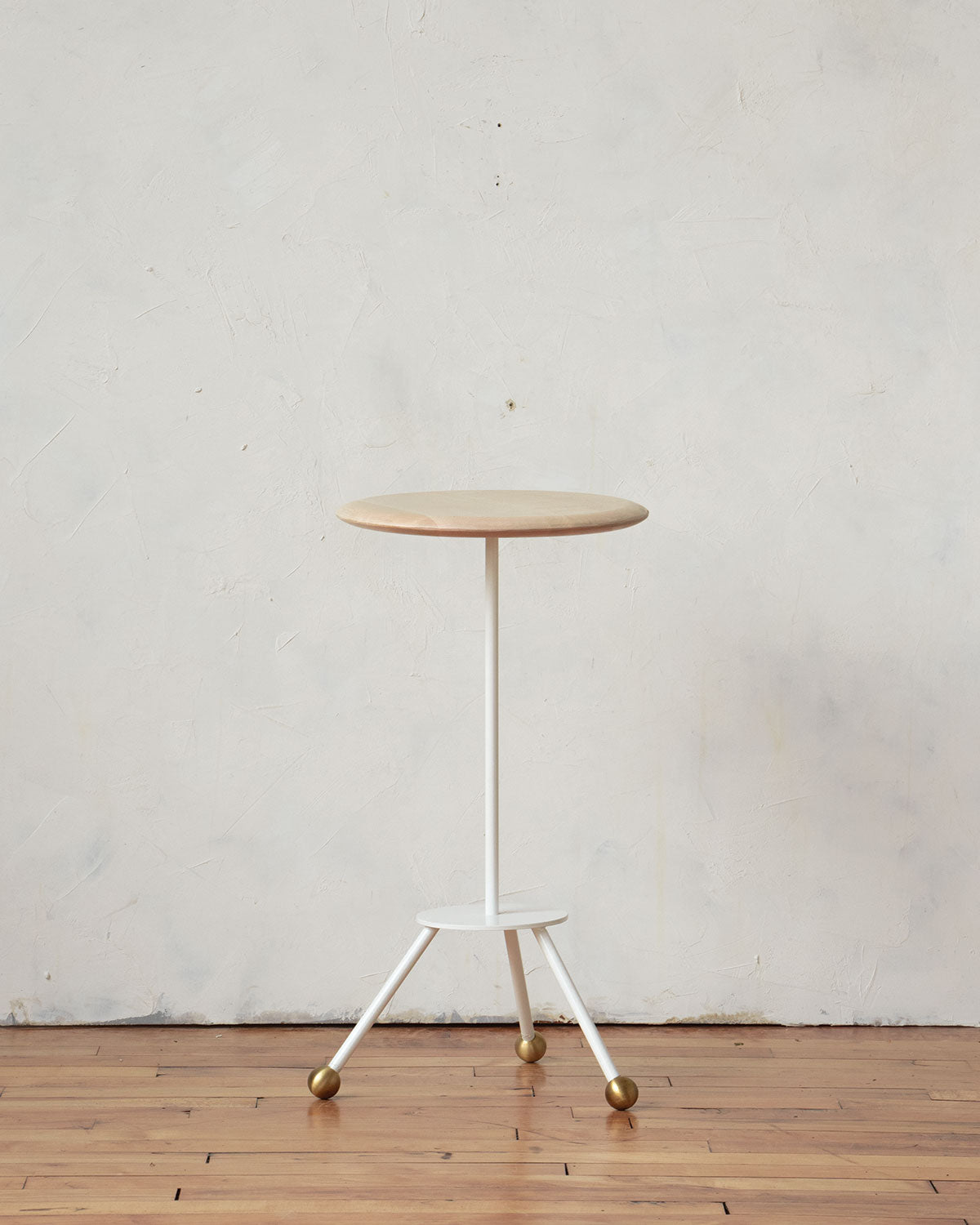 Modern tripod white side table, bedside table. Handmade in Philadelphia by Lostine. Simple Interior Design