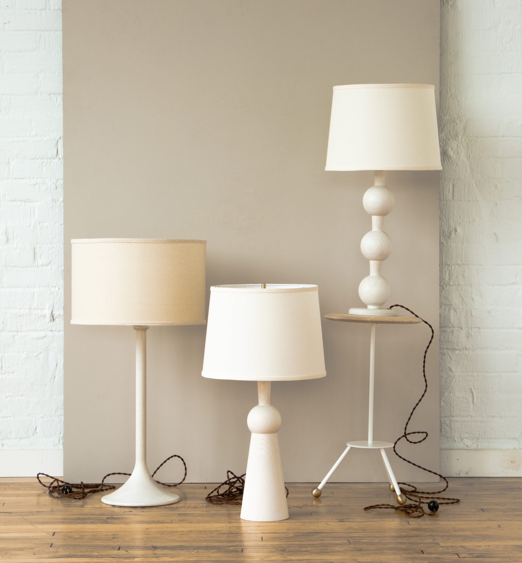 Collection of Lostine white washed wood turned lamps